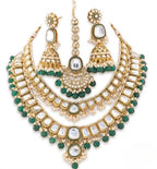 Jewel City Grand Kundan & Emerald Green Bead Necklace Set with Jhumka Earrings & Maang Tikka | Grocsy