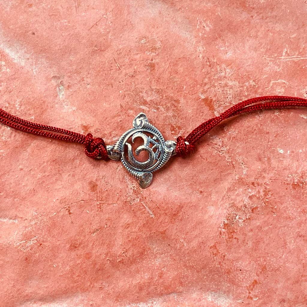 trueBrowns 925 Sterling Silver Textured Om Thread Rakhi | Grocsy