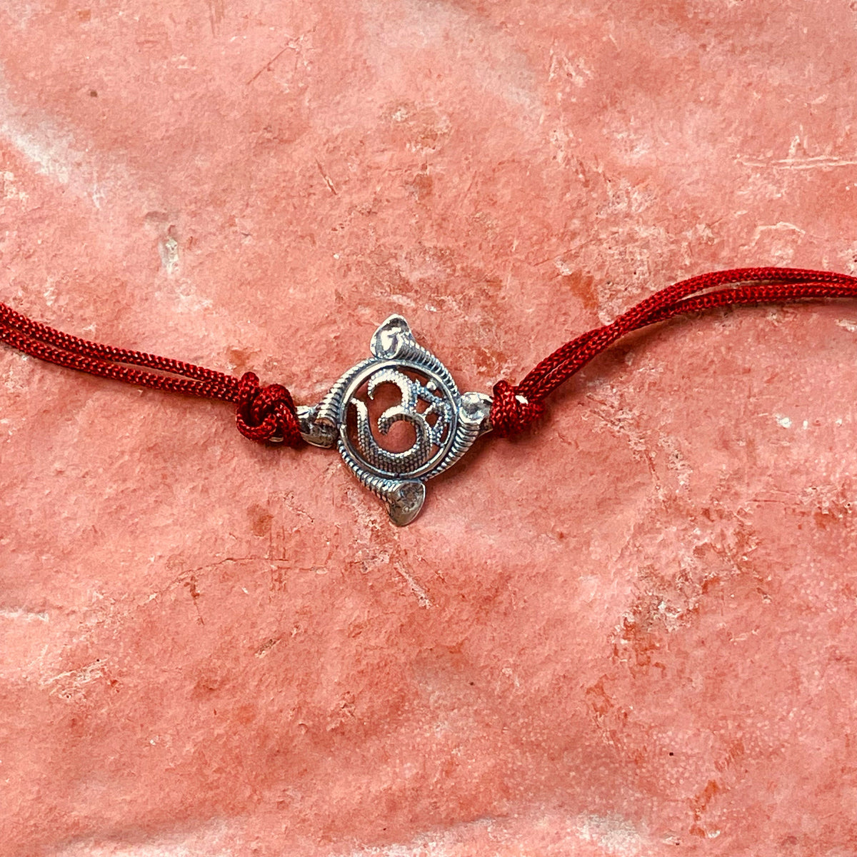 trueBrowns 925 Sterling Silver Textured Om Thread Rakhi | Grocsy