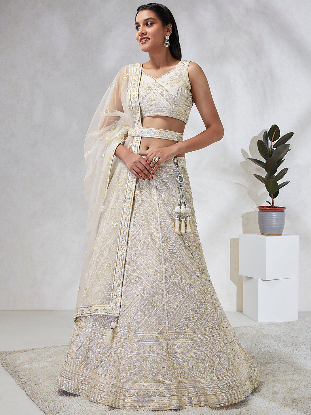 House of Panchhi Cream Net Cutdana, Sequins And Zarkan Embroidery Lehenga Choli & Dupatta | Grocsy