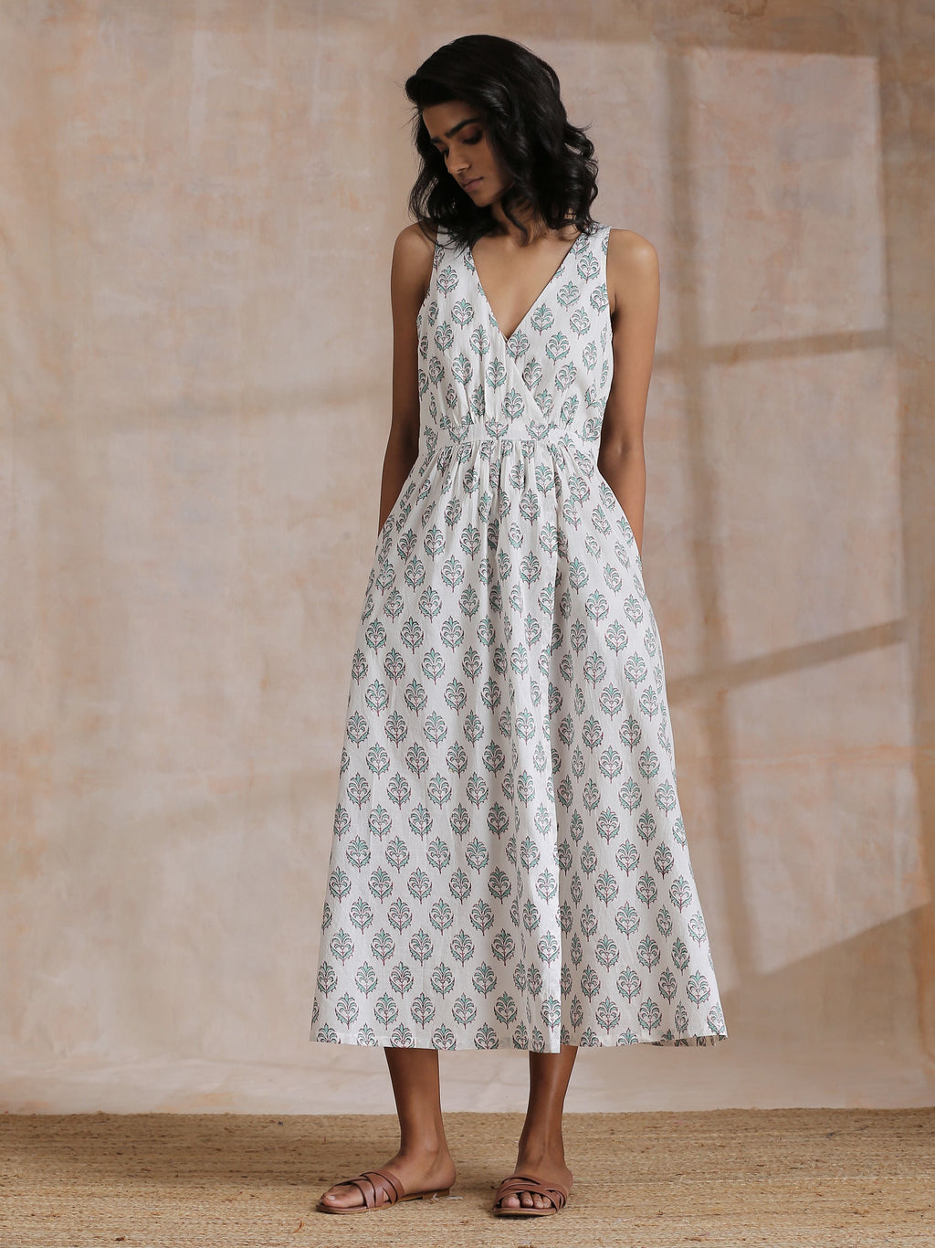 trueBrowns Green Buta On White Block Print Cotton Sleeveless Wrap Dress | Grocsy