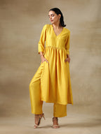 trueBrowns Yellow Textured Silk High Slit Gathered Kurta Set | Grocsy