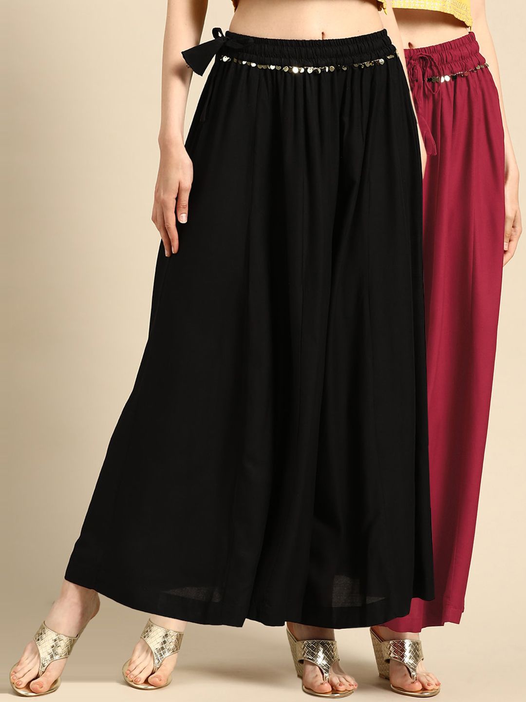 TAG 7 Women Black & Maroon Solid Flared Palazzos | Grocsy