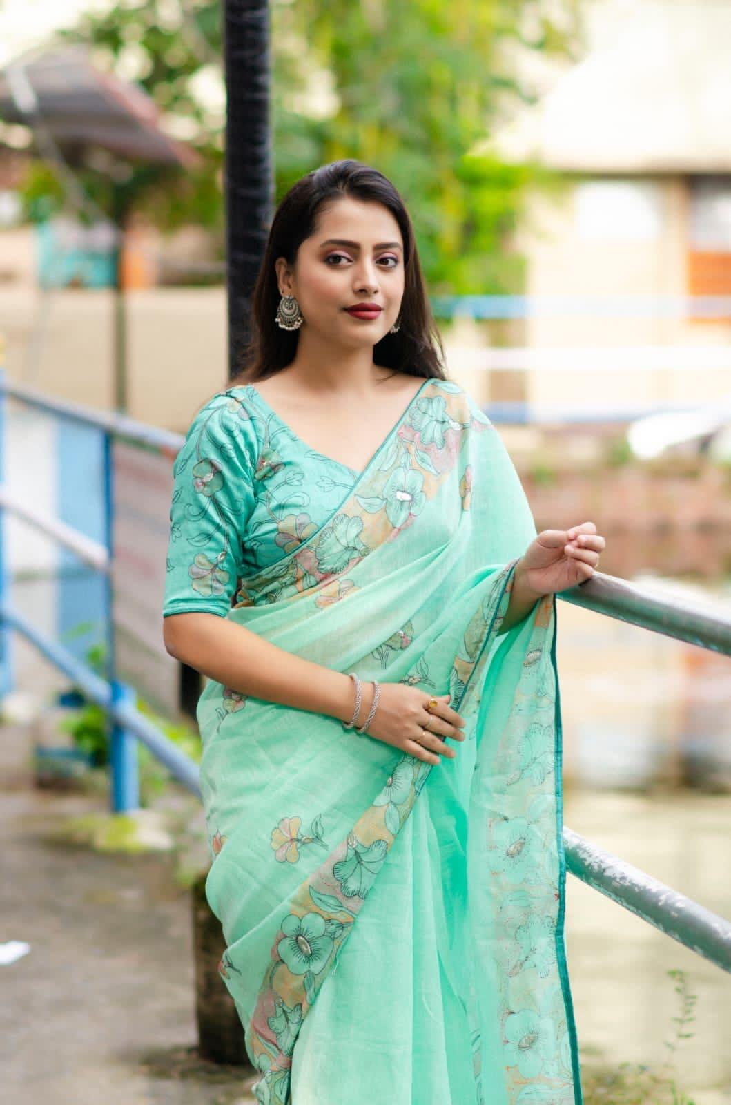 Seagreen Pure Linen Ethnic Motifs Saree with Unstitched Blouse - A2M | Grocsy