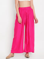 TAG 7 Women Pink Solid Flared Palazzos | Grocsy