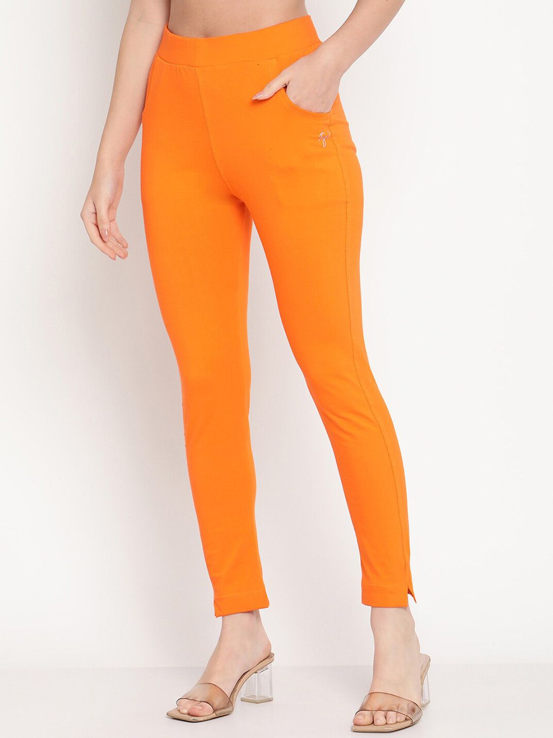 TAG 7 Women Orange Solid Leggings | Grocsy