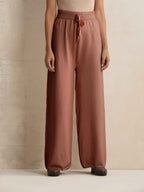 trueBrowns Peach Woollen Flared Pants | Grocsy