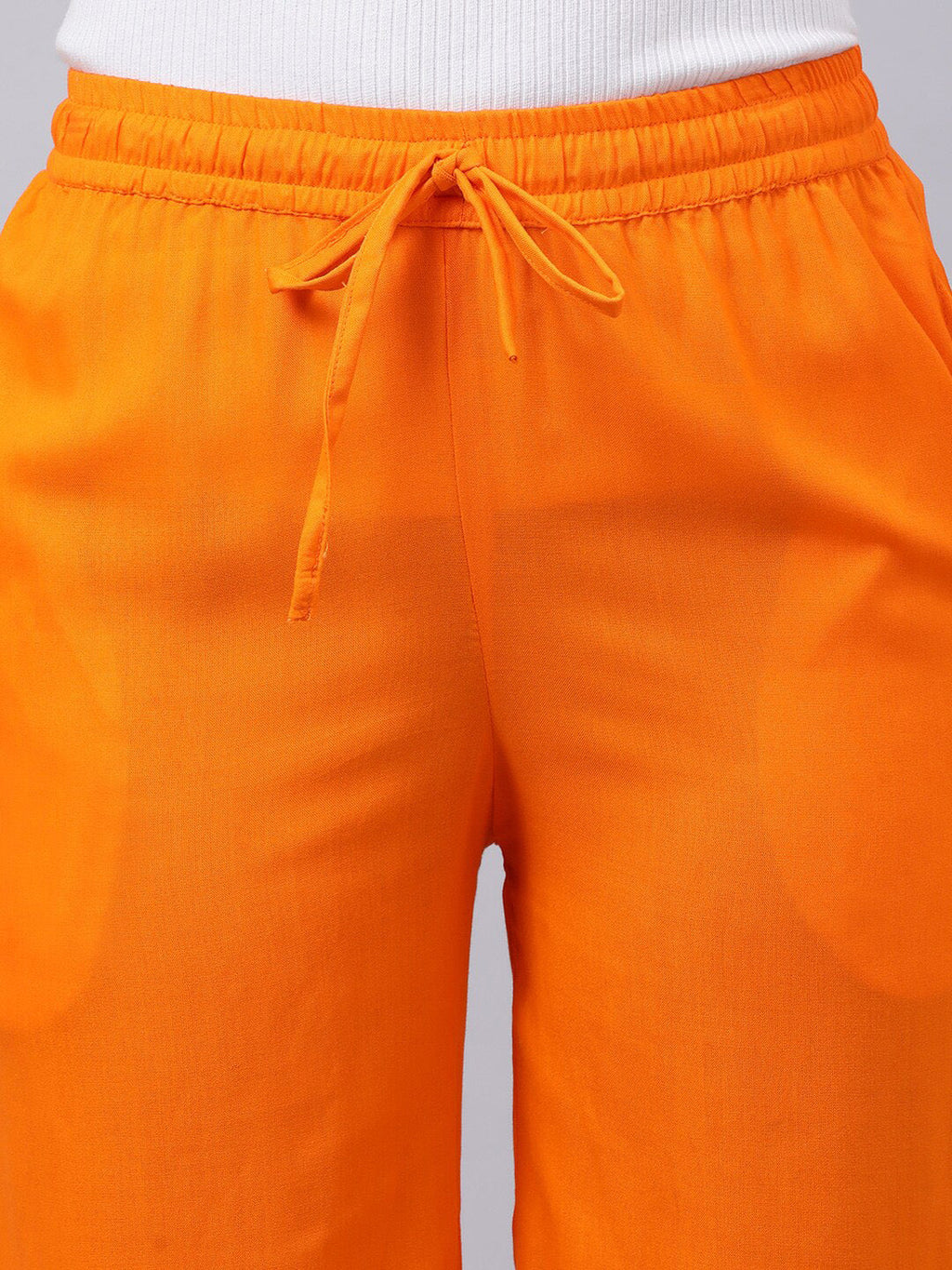 Souchii Women Orange Trousers | Grocsy