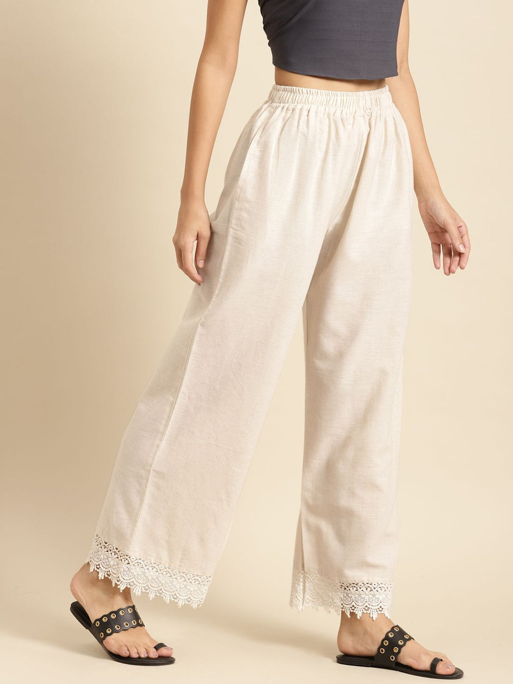 TAG 7 Women Off-White Solid Hem Design Straight Palazzos | Grocsy