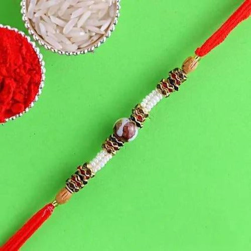 Striking Pearl Rakhi | Grocsy