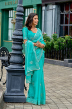 Vastranavya Turquoise Embroidery Work Shimmer Chiffon Saree with Unstitched Blouse | Grocsy