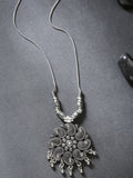 NVR Women's Silver-Toned Floral Shape Pendant with Chain | Grocsy