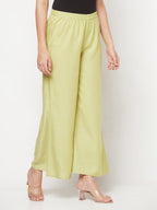Aniyah Rayon Flared Slip-On Pista Color Palazzo | Grocsy
