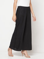 Aniyah Rayon Flared Slip-On Black Palazzo | Grocsy