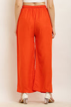 PAVONINE Orange Color Straight Fit Rayon Fabric Palazzo | Grocsy