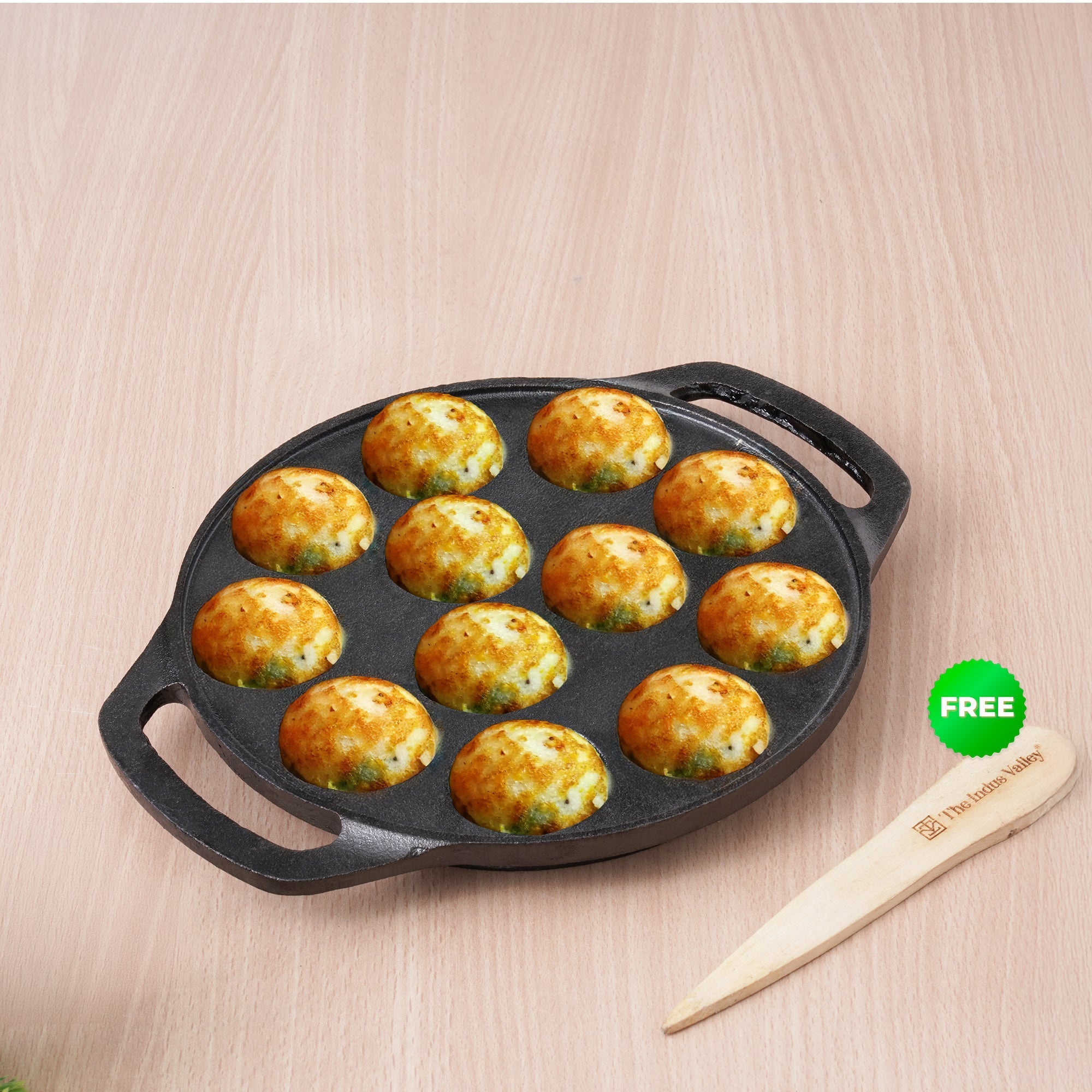 The Indus Valley 12 Pit/Cup CASTrong Cast Iron Kuzhi Paniyaram/Paddu Pan/Appe Maker, Pre-seasoned, 100% Pure, Toxin-free, Spatula, 21 cm, 2.2 kg | Grocsy