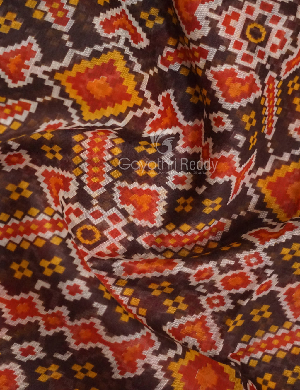 Shades of Brown Colour Patola Print Semi Chanderi Saree By Gayathri Reddy Designer Studio | Grocsy