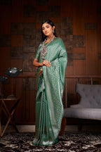 Vardha Teal Green Silver Zari Kanjeevaram Silk Saree | Grocsy