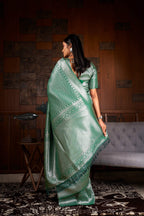 Vardha Teal Green Silver Zari Kanjeevaram Silk Saree | Grocsy