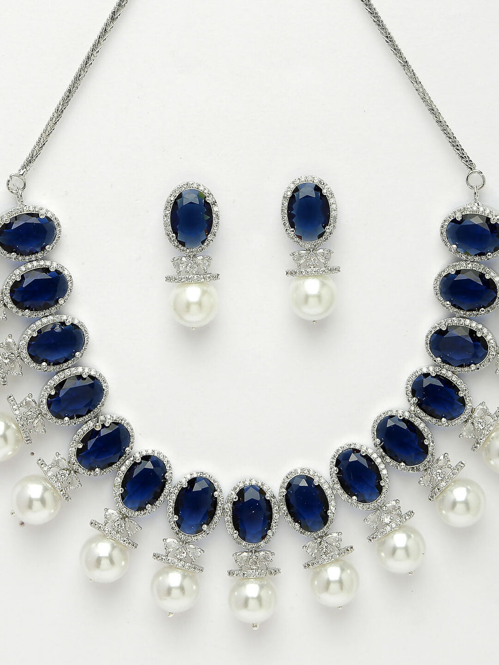 NVR Women's Silver-Plated Blue American Diamond Studded Handcrafted Jewellery Set | Grocsy