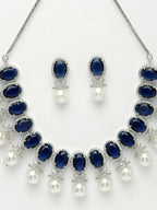 NVR Women's Silver-Plated Blue American Diamond Studded Handcrafted Jewellery Set | Grocsy