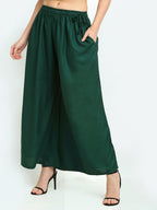 TAG 7 Women Green Solid Flared Palazzos | Grocsy