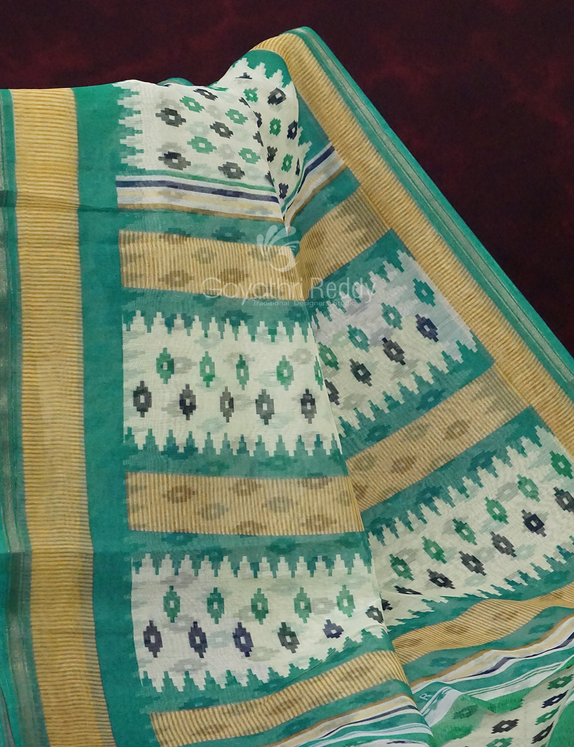 Combo of Off White and Rama Green Patan Patola Semi Chanderi Saree By Gayathri Reddy Designer Studio | Grocsy