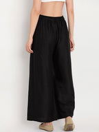 TAG 7 Women Black Solid Flared Palazzos | Grocsy