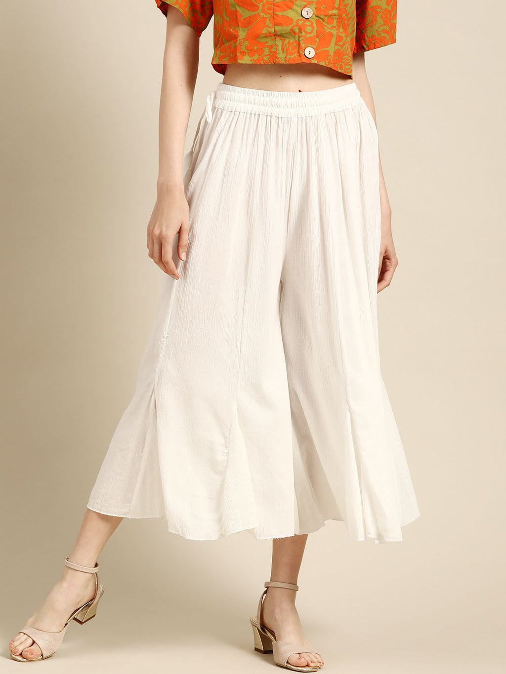 TAG 7 Women White Solid Crushed Flared Cropped Palazzos | Grocsy