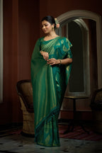 Vardha Teal Green Golden Zari Kanjeevaram Silk Saree | Grocsy