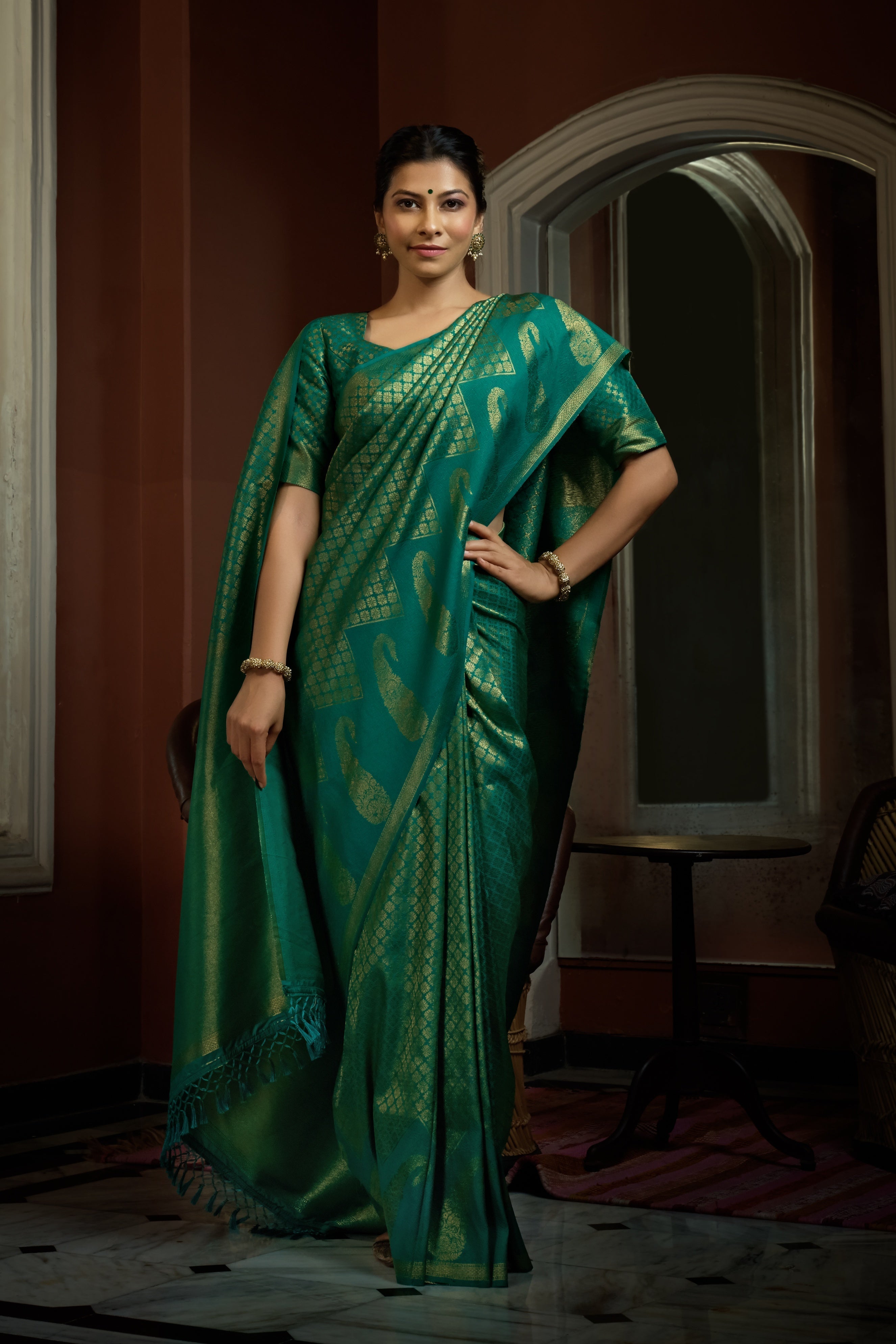 Vardha Teal Green Golden Zari Kanjeevaram Silk Saree | Grocsy