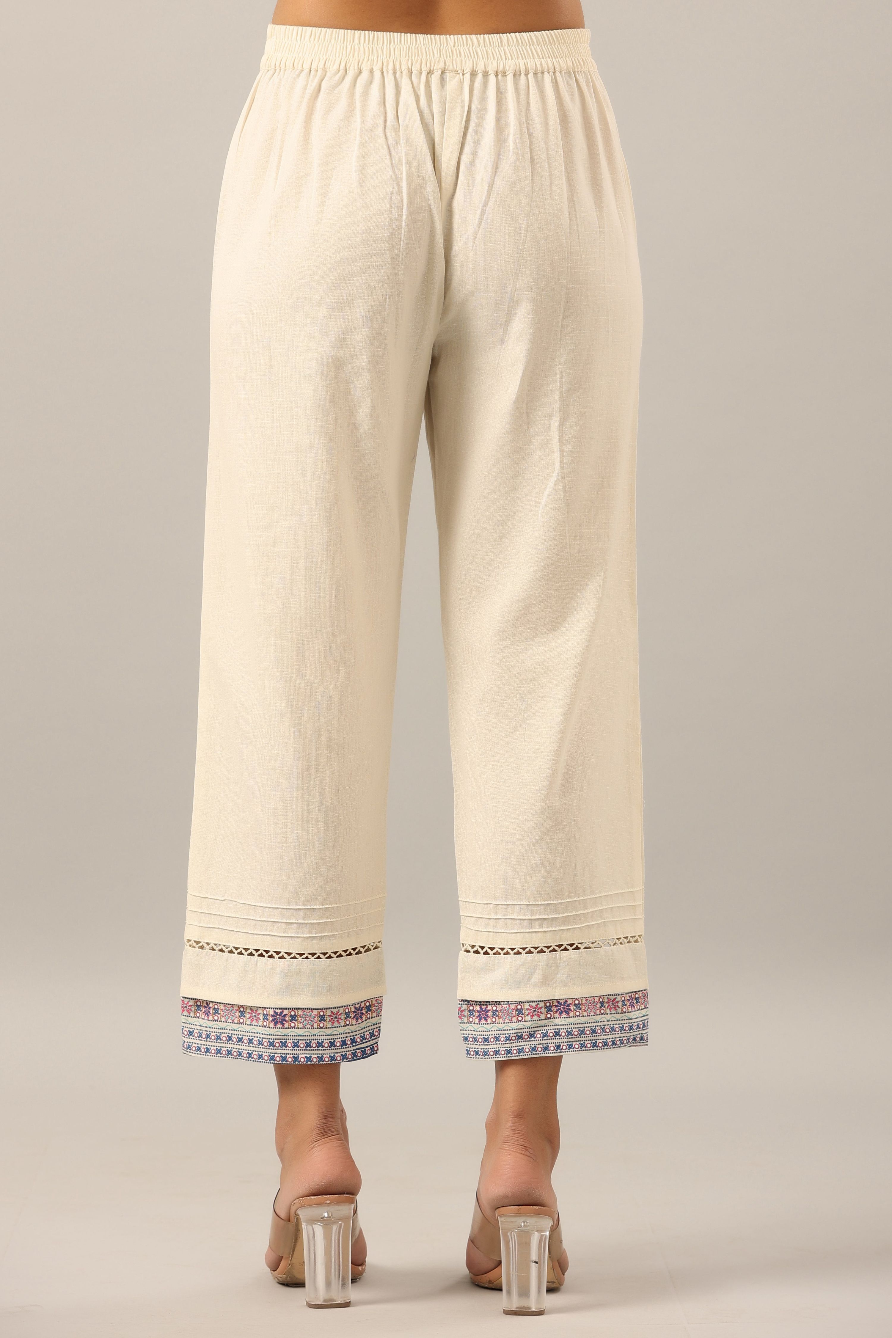 Juniper Women's Off-White Solid Cotton Flex Pants With Printed Hem, Pintucks & Lace Work | Grocsy