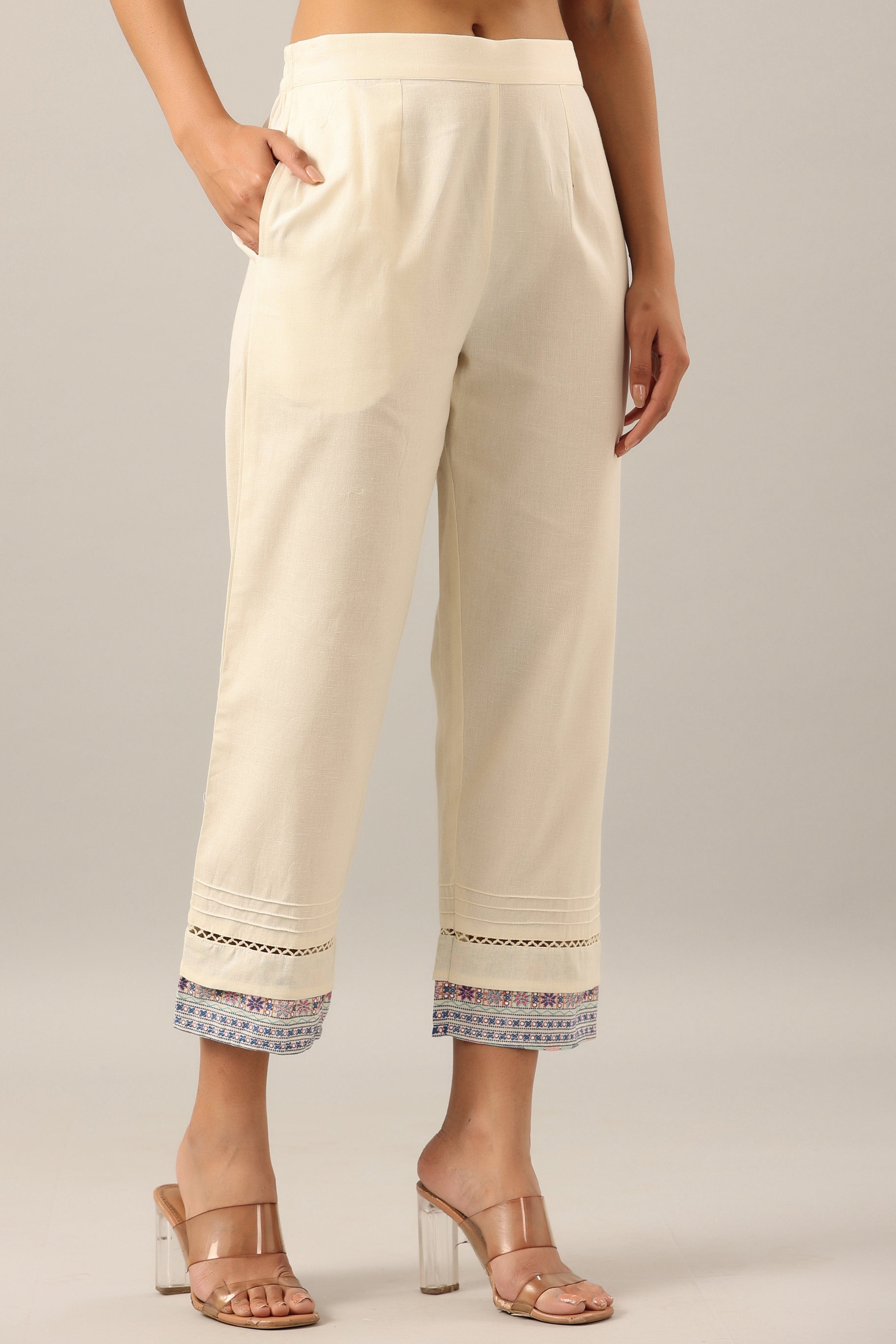 Juniper Women's Off-White Solid Cotton Flex Pants With Printed Hem, Pintucks & Lace Work | Grocsy