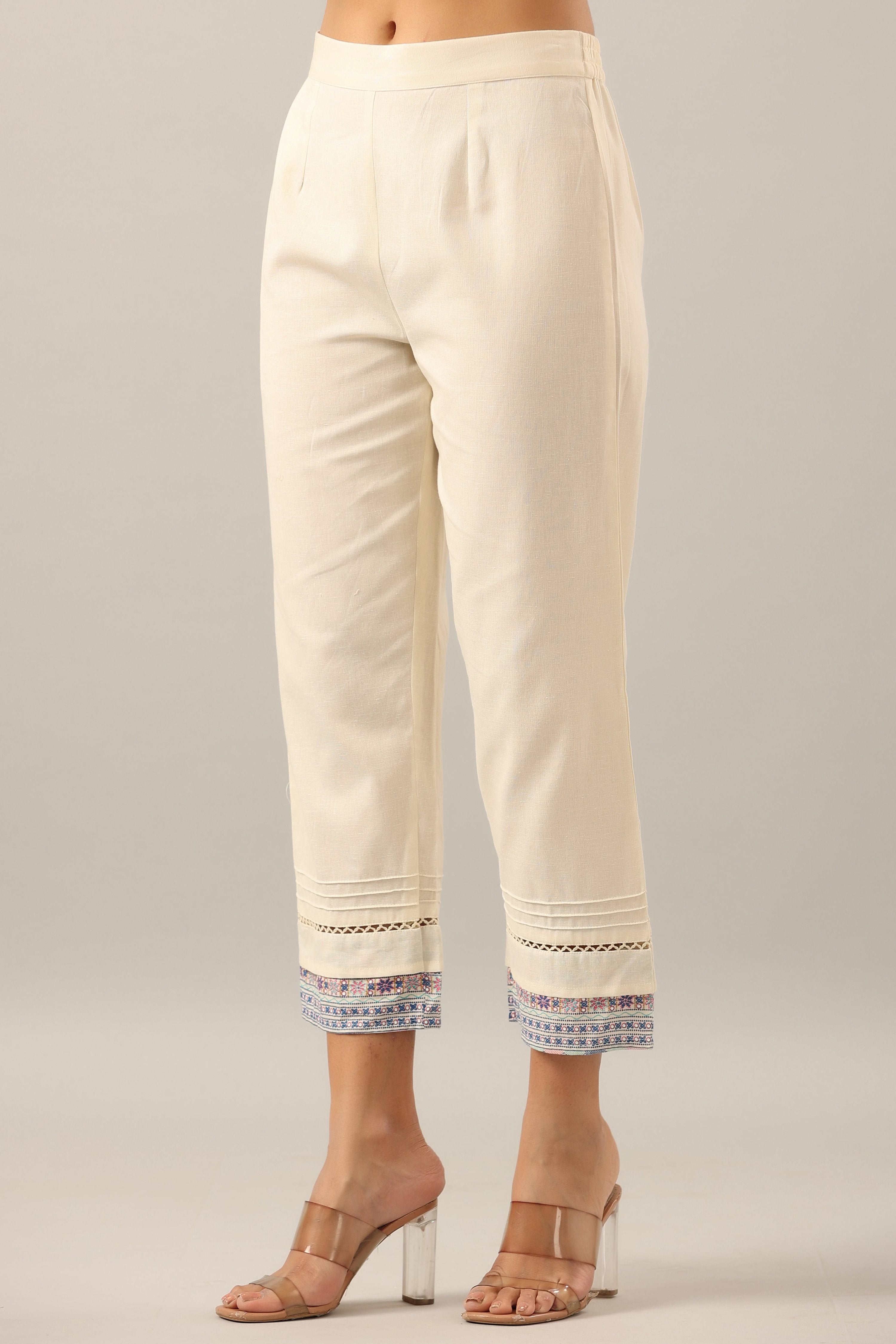 Juniper Women's Off-White Solid Cotton Flex Pants With Printed Hem, Pintucks & Lace Work | Grocsy
