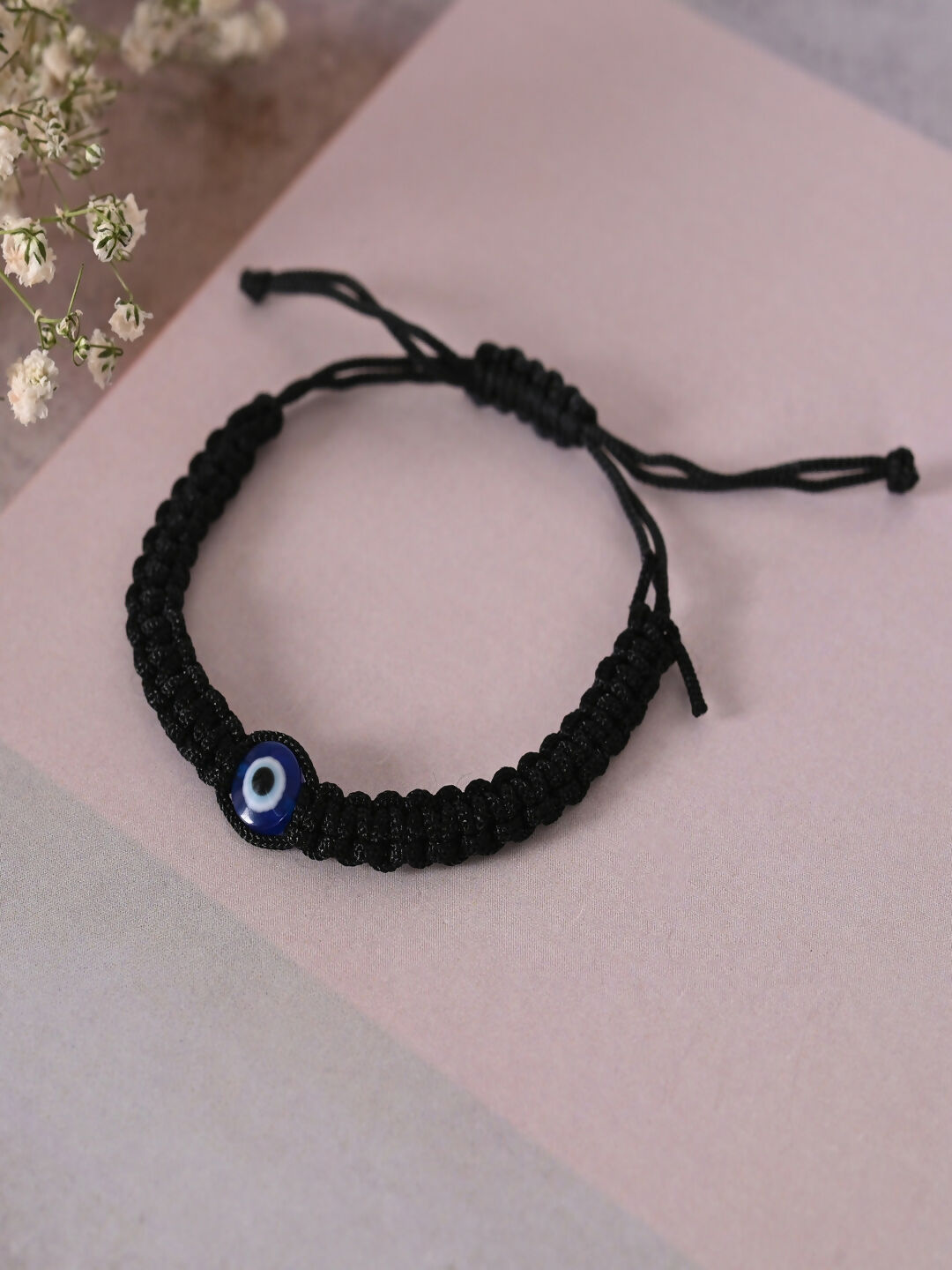 NVR Women & Men Black Evil Eye Rakhi With Roli Chawal | Grocsy