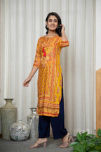 Juniper Women's Mustard Ethnic Motif Printed Shantoon Kurta With Doris & Tassels | Grocsy