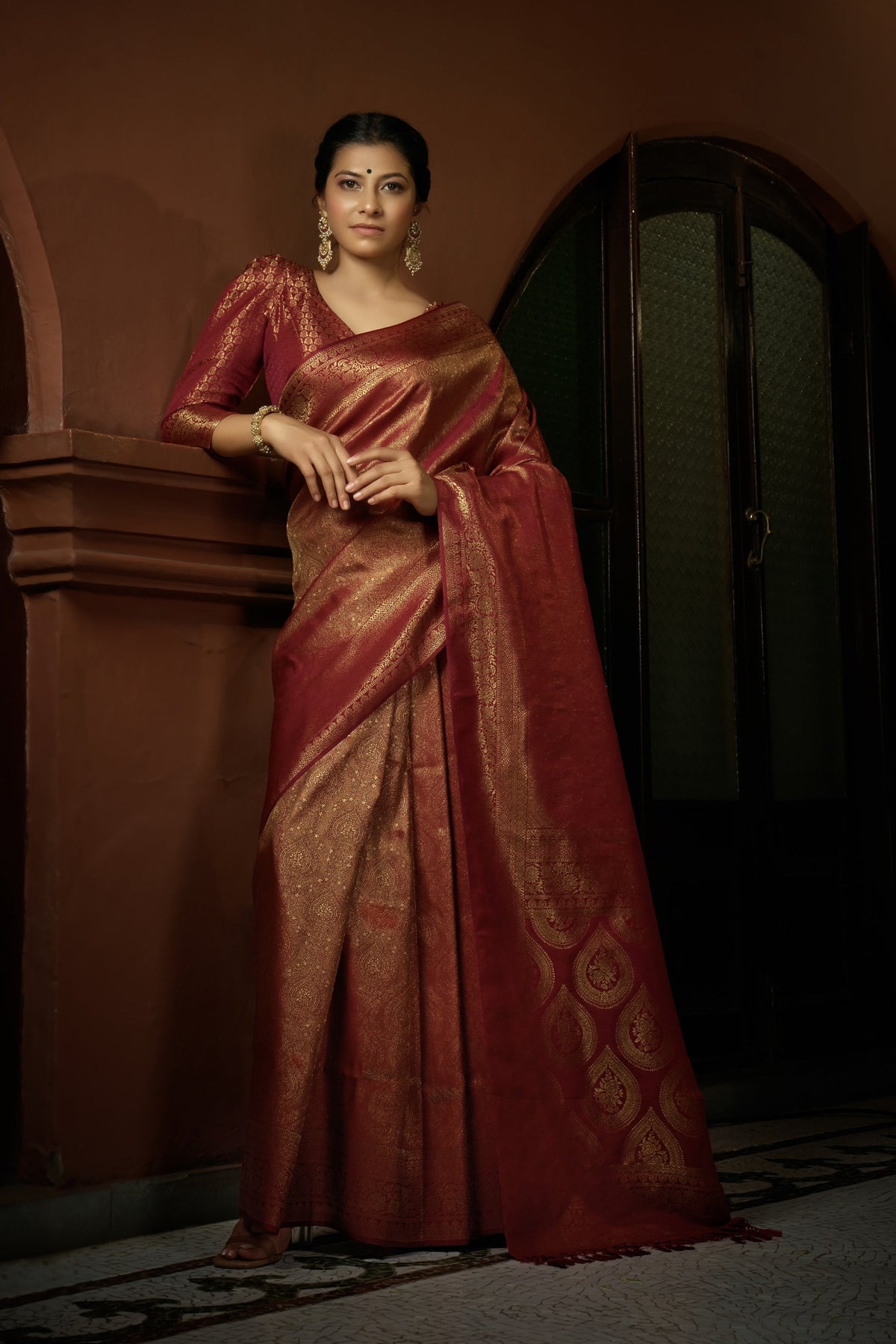 Vardha Carnelian Maroon Golden Zari Kanjeevaram Silk Saree | Grocsy
