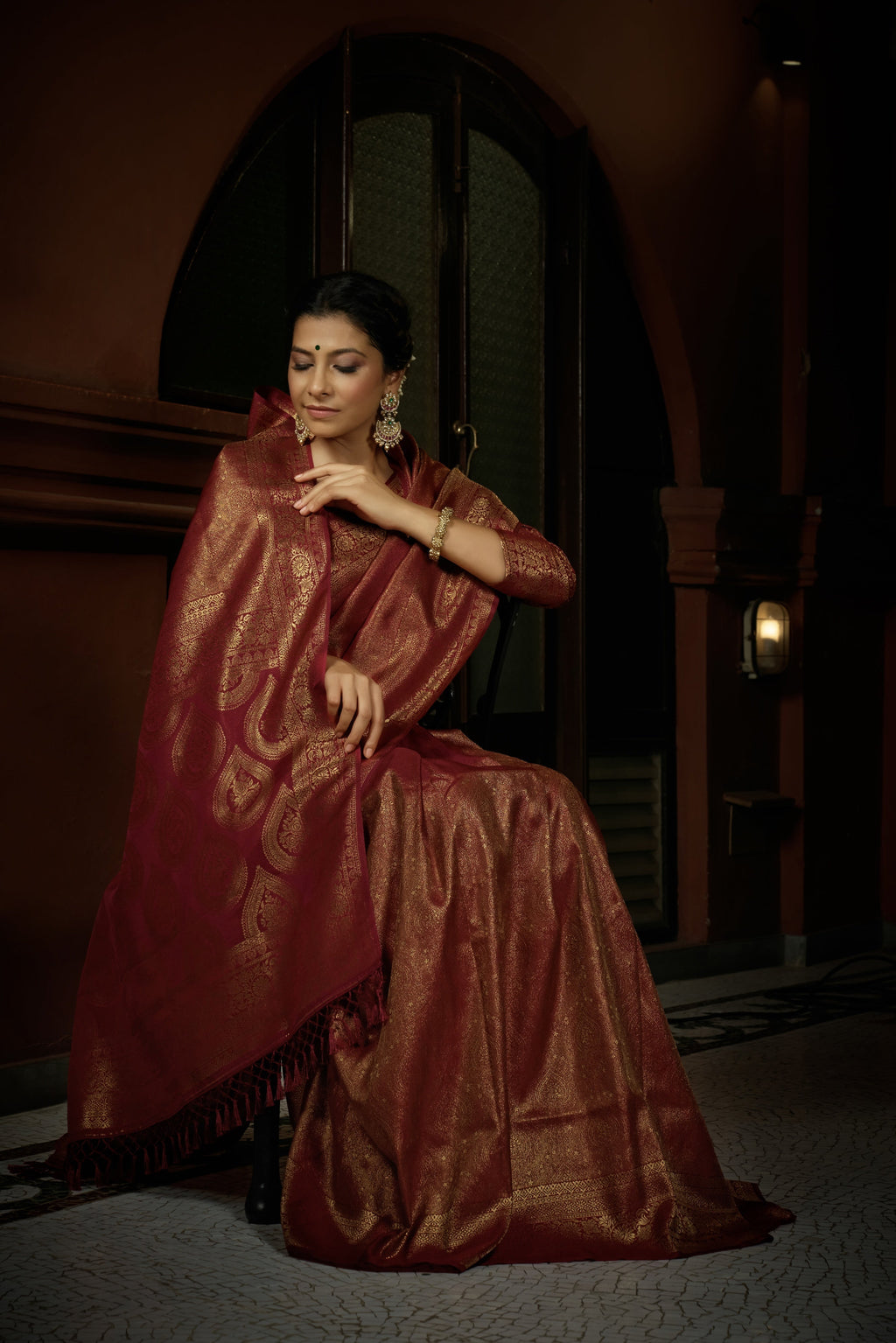 Vardha Carnelian Maroon Golden Zari Kanjeevaram Silk Saree | Grocsy