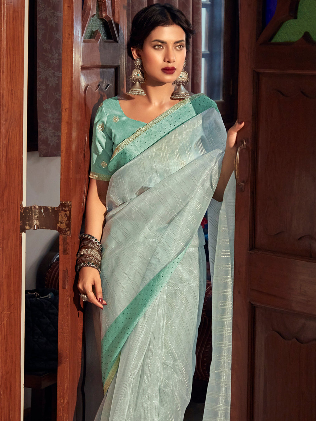 Stylee Lifestyle Green Organza Woven Saree | Grocsy