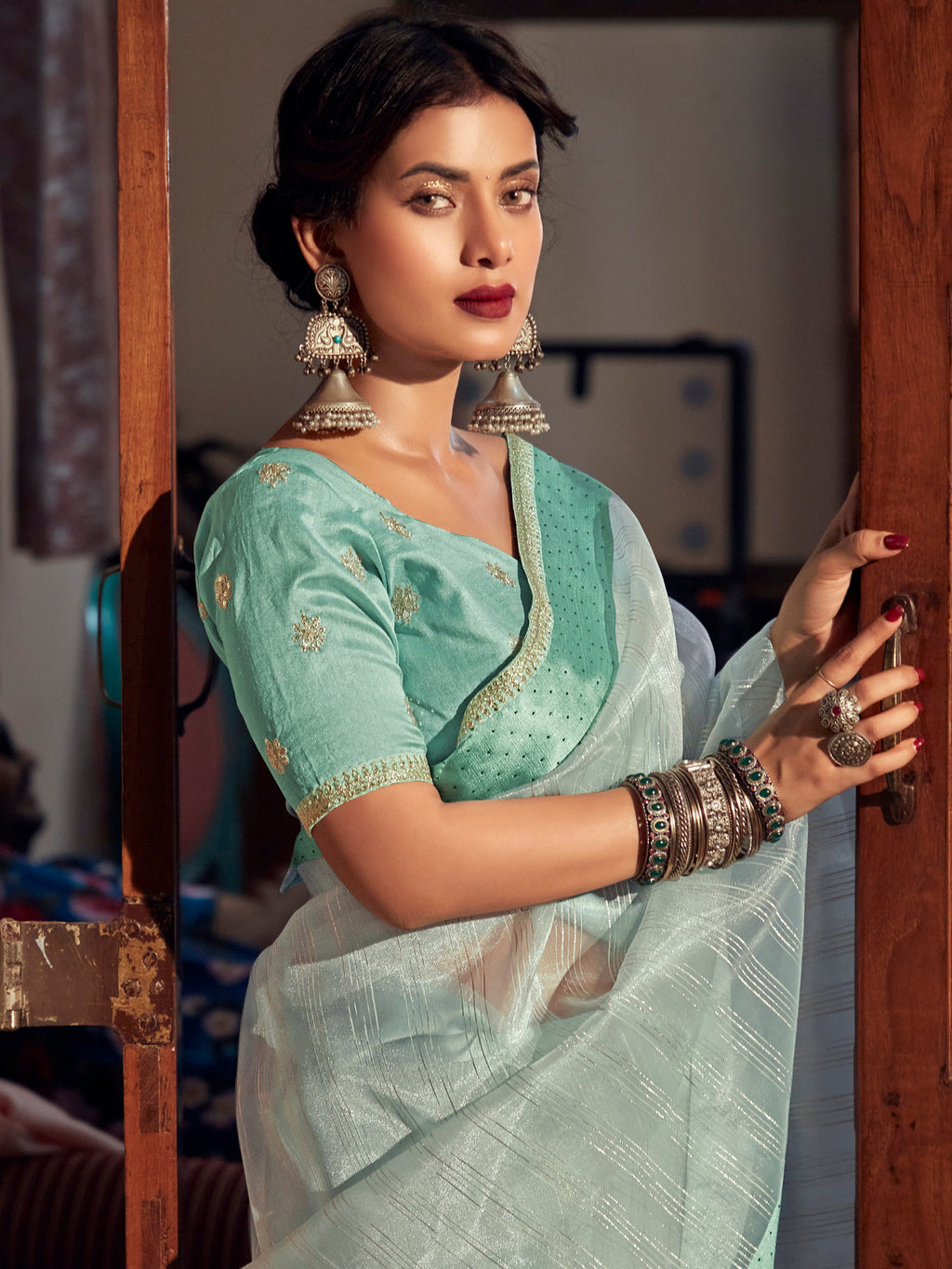 Stylee Lifestyle Green Organza Woven Saree | Grocsy