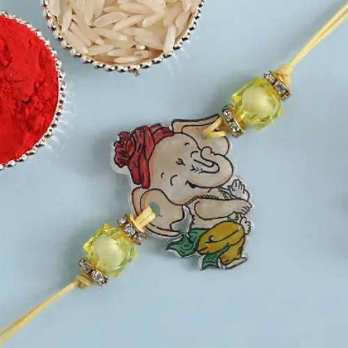 Bal Ganesha Rakhi & Kaju Rolls Box | Grocsy