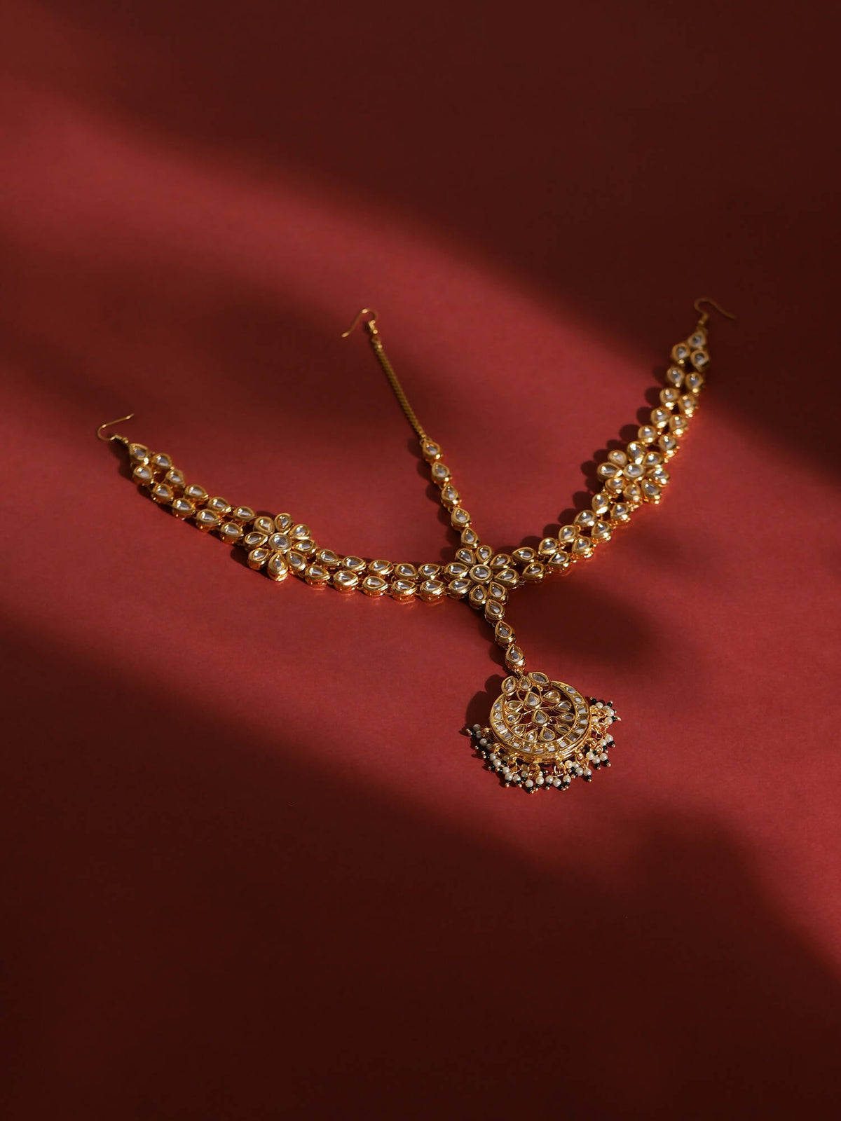 Gold-Polished White Kundan-Studded Pearl Beaded Matha Patti - Ruby Raang | Grocsy