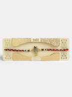 NVR Men Gold-Toned Peacock Design Stone-Studdded Rakhi With Roli Chawal & Chocolate | Grocsy