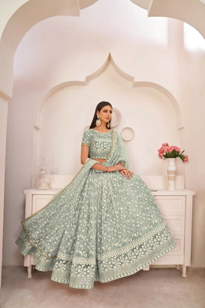 Aastha Fashion Turquoise Green Butterfly Net White Cotton Thread Work, Zari Work And Sandwich Sequence Work Embroidery Wedding Wear Lehenga Choli | Grocsy