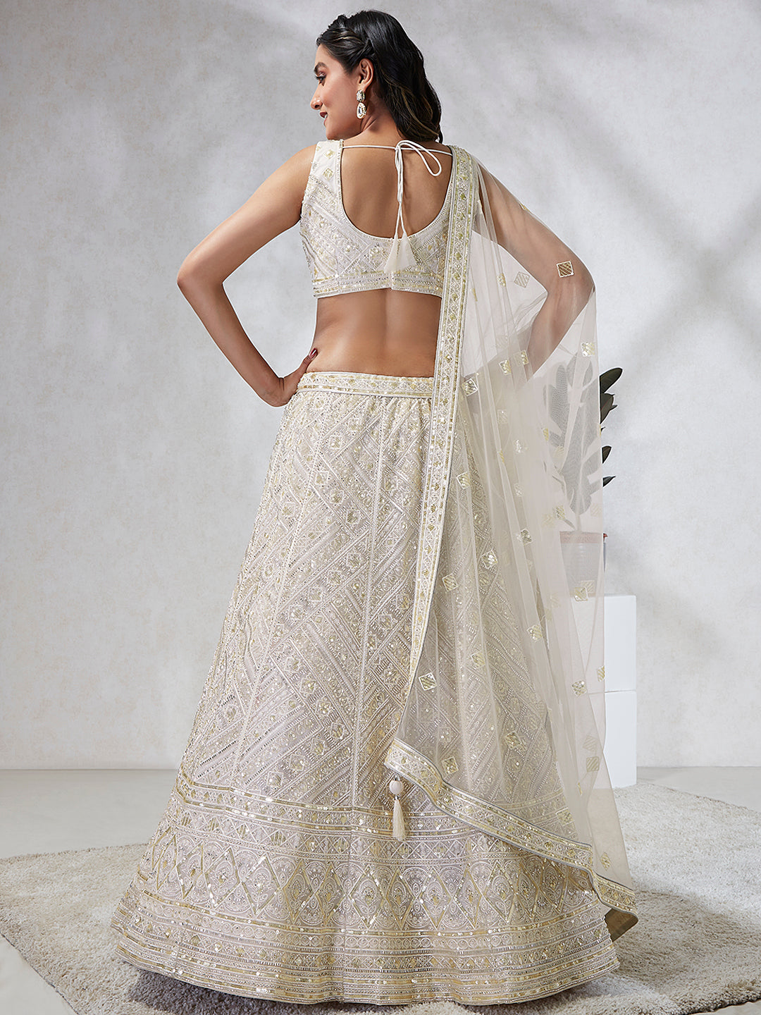 House of Panchhi Cream Net Cutdana, Sequins And Zarkan Embroidery Lehenga Choli & Dupatta | Grocsy
