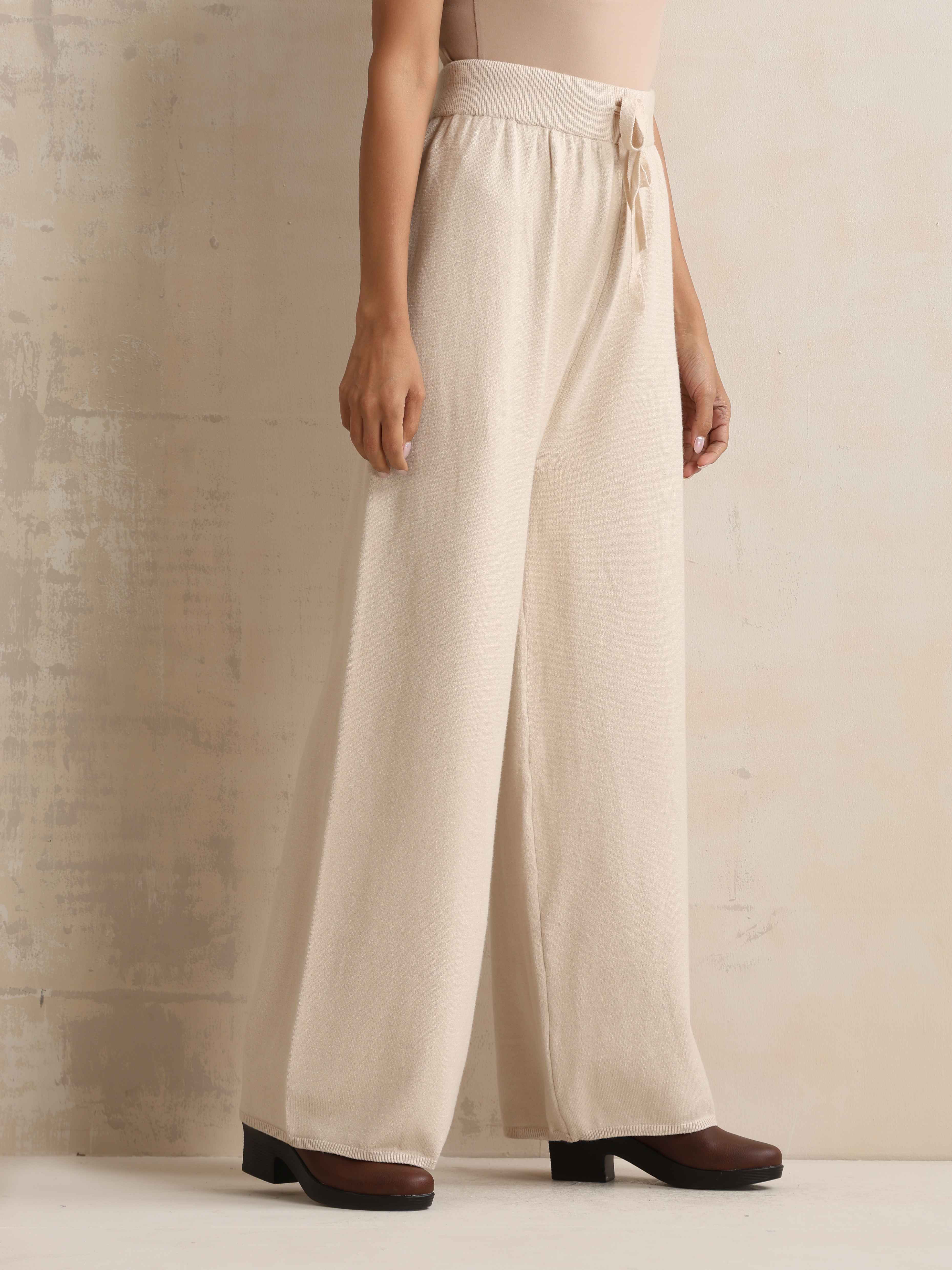 trueBrowns Ivory Woollen Flared Pants | Grocsy