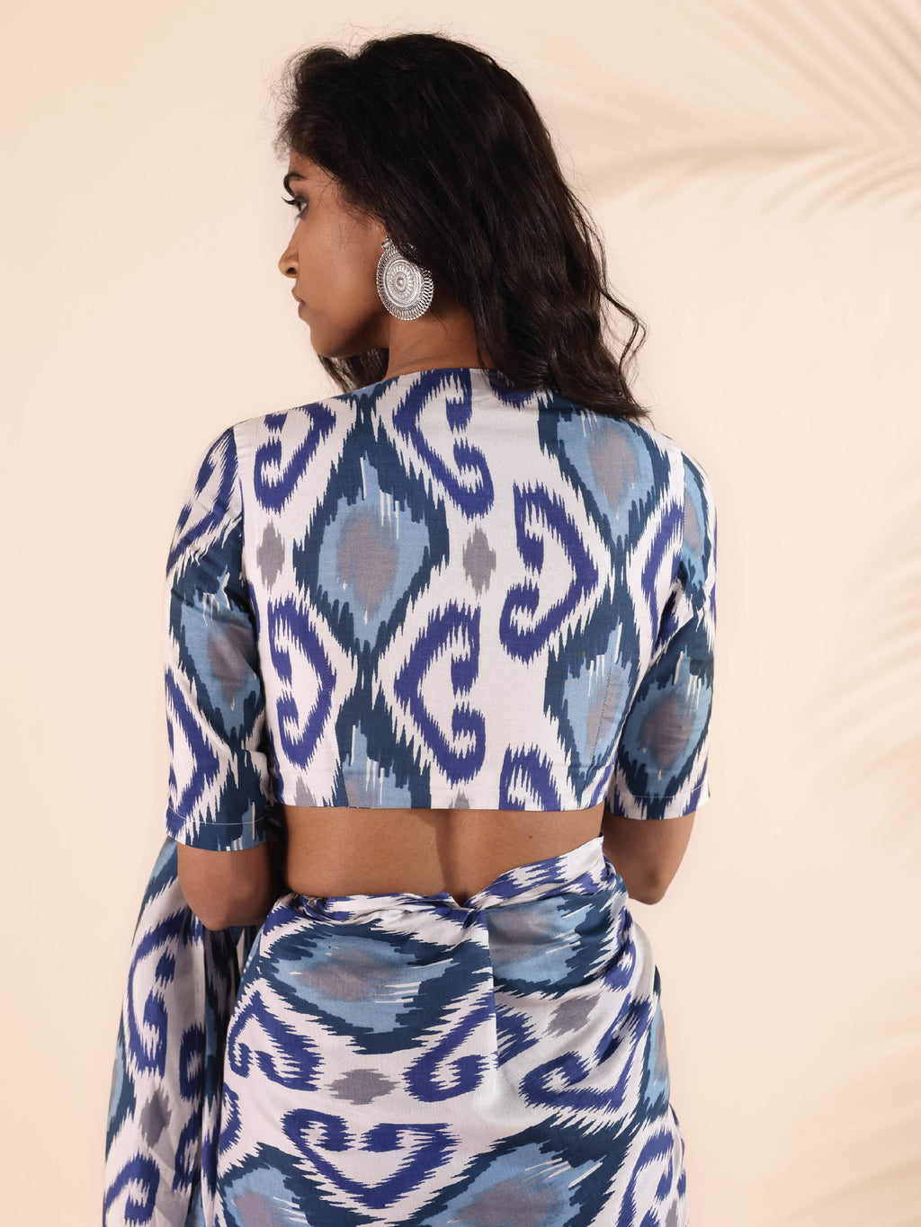 trueBrowns Blue Muslin Ikat Deep V-Neck Blouse | Grocsy