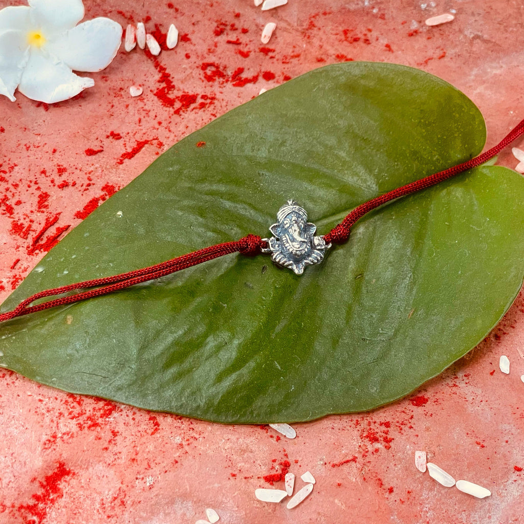 trueBrowns 925 Sterling Silver Lord Ganesh Idol Thread Rakhi | Grocsy