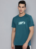 Alcis Men Teal Printed Slim Fit Running T-shirt | Grocsy