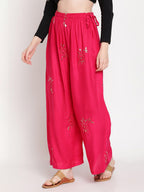 TAG 7 Women Pink & Gold-Toned Ethnic Motifs Embellished Flared Palazzos | Grocsy